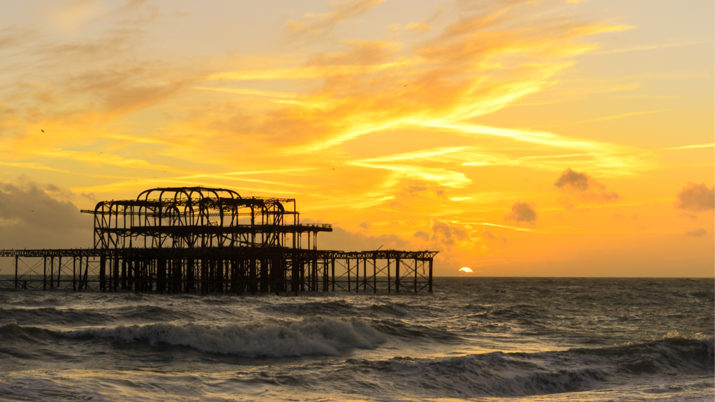 A sunset over a pier