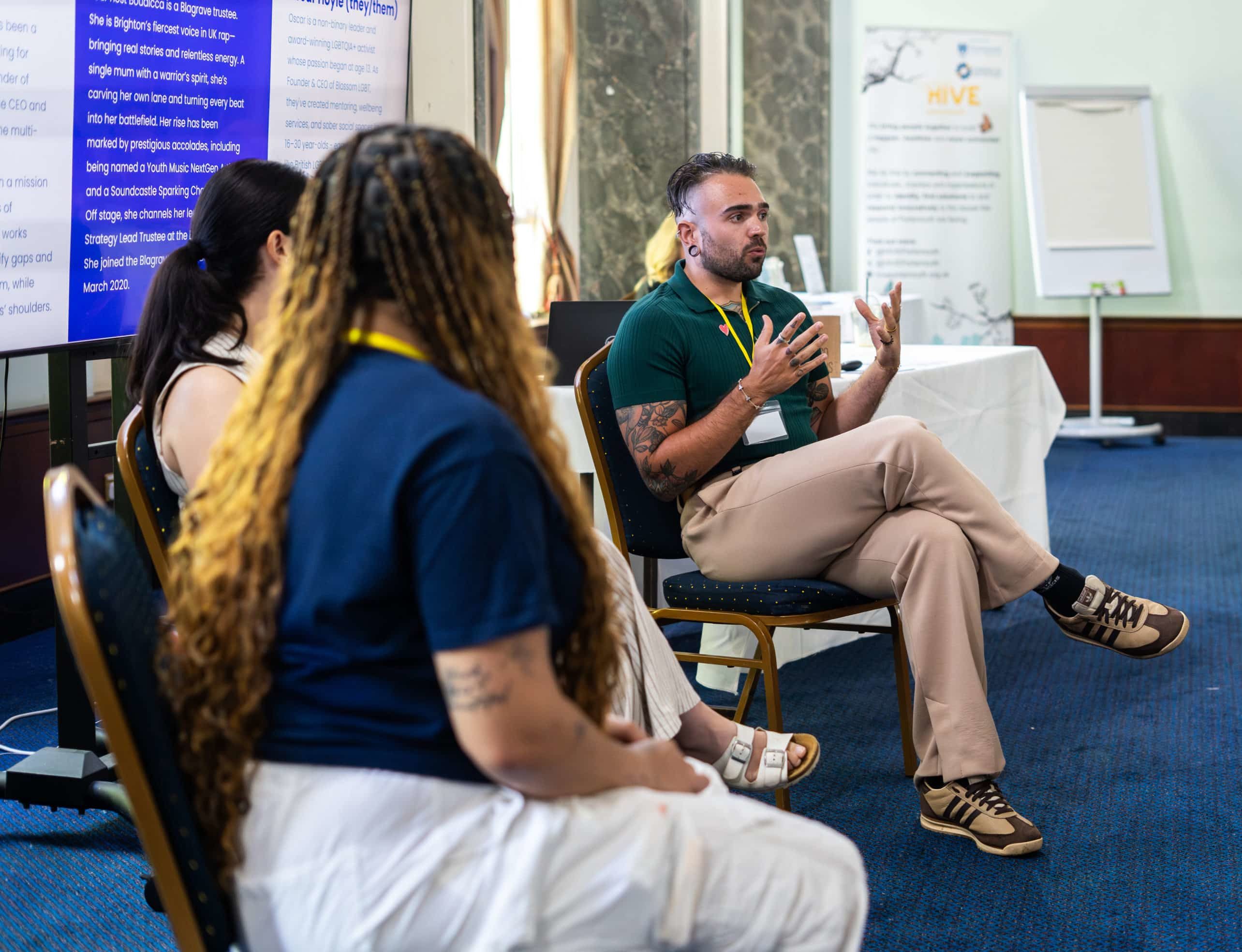 A panel discussion with 3 people