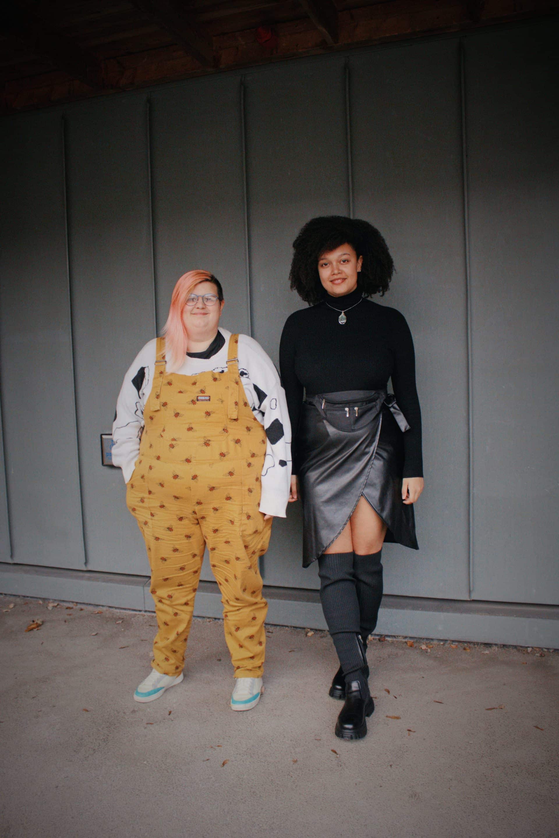 2 people taking a picture standing together