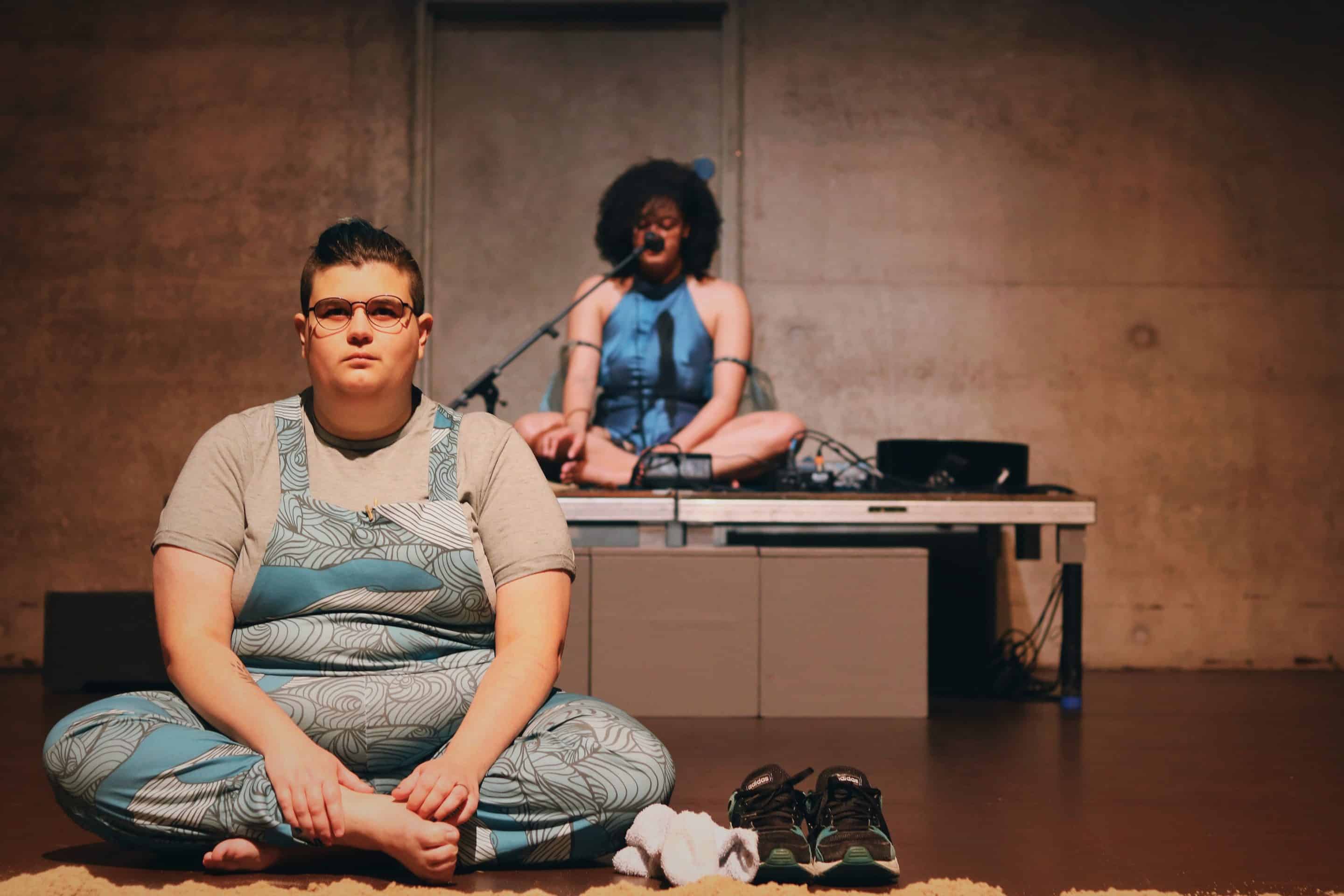 a performance with 2 people in the frame